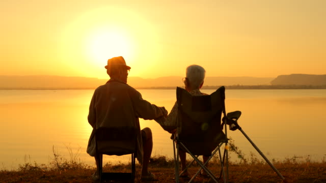 lake-sunset-couple-chairs